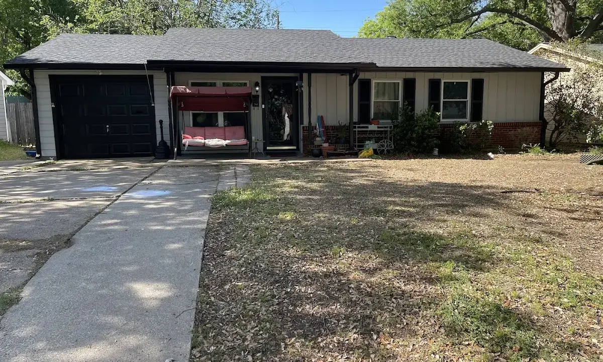 Asphalt Shingle Roof Repair crew at work on a residential roof in Prairieville